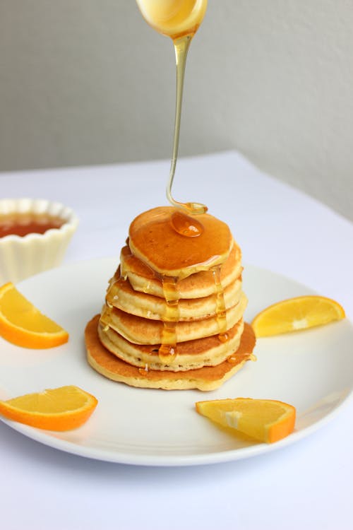 Free Dripping Syrup on Stack of Pancakes Stock Photo