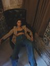 A Woman Slouching on a Chair