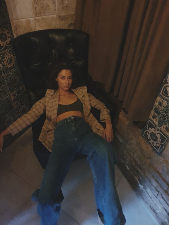 A Woman Slouching on a Chair · Free Stock Photo