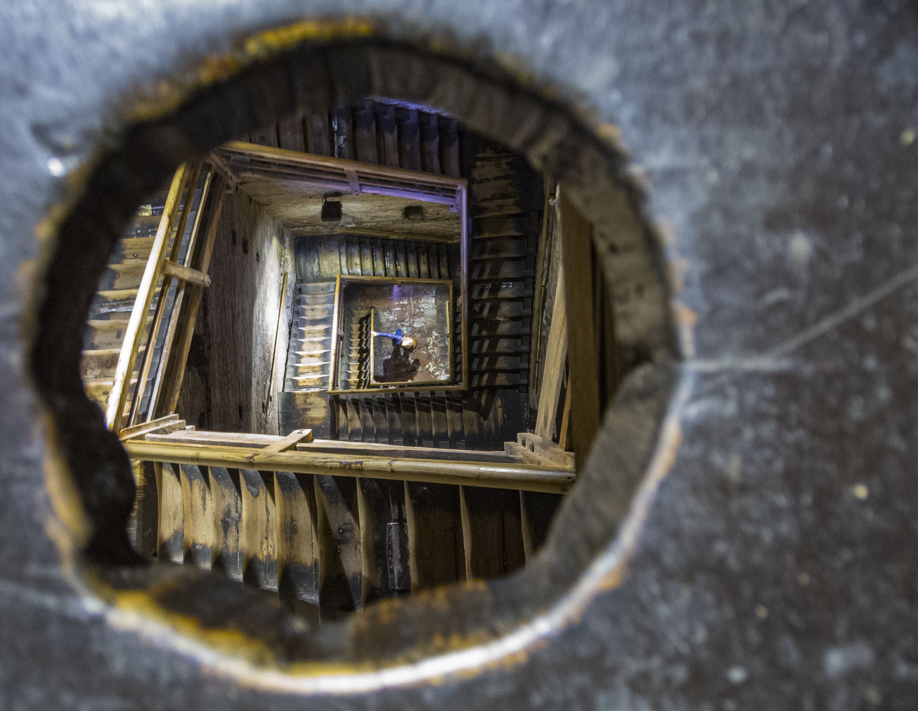 Hidden corridor with stone steps inside a palace