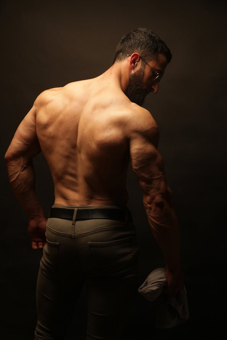 Back Muscles Of A Shirtless Man