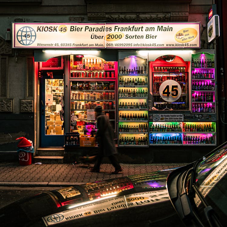 Multicolour Illuminated Kiosk At Night