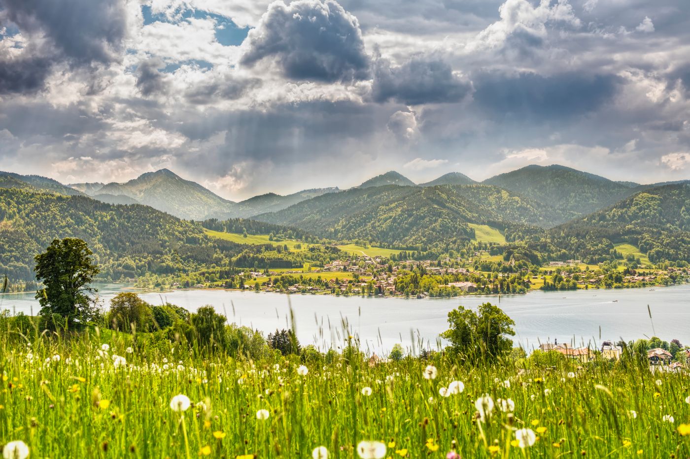 Panorama of the Tegernsee lake below the Bavarian Alps in summer