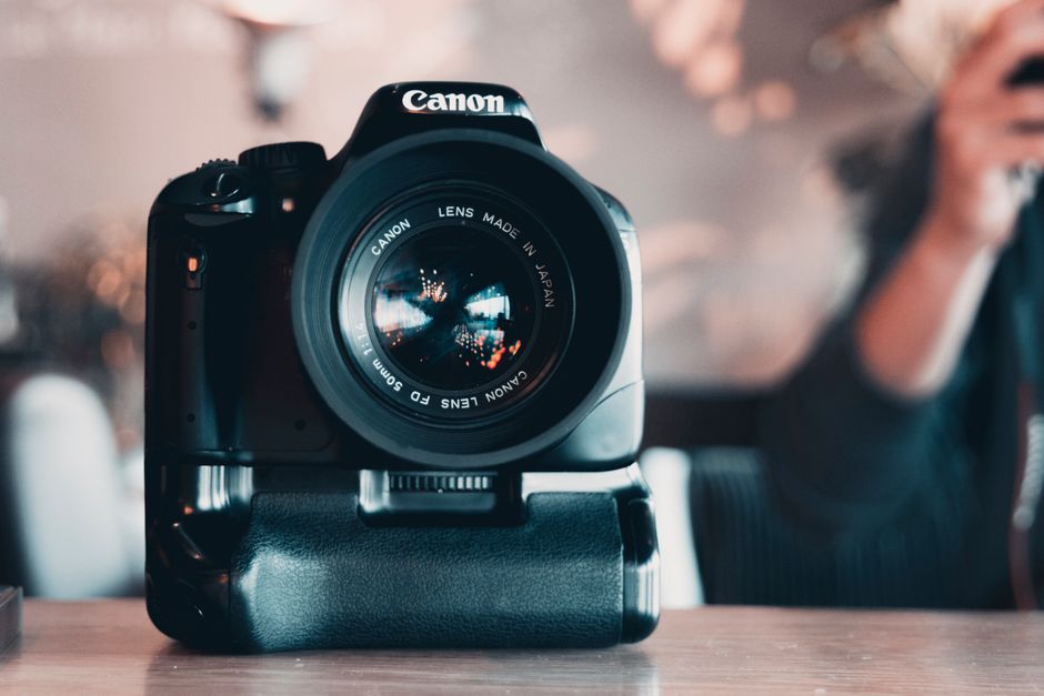 Close-up shot of a Canon DSLR camera, perfect for photography enthusiasts.