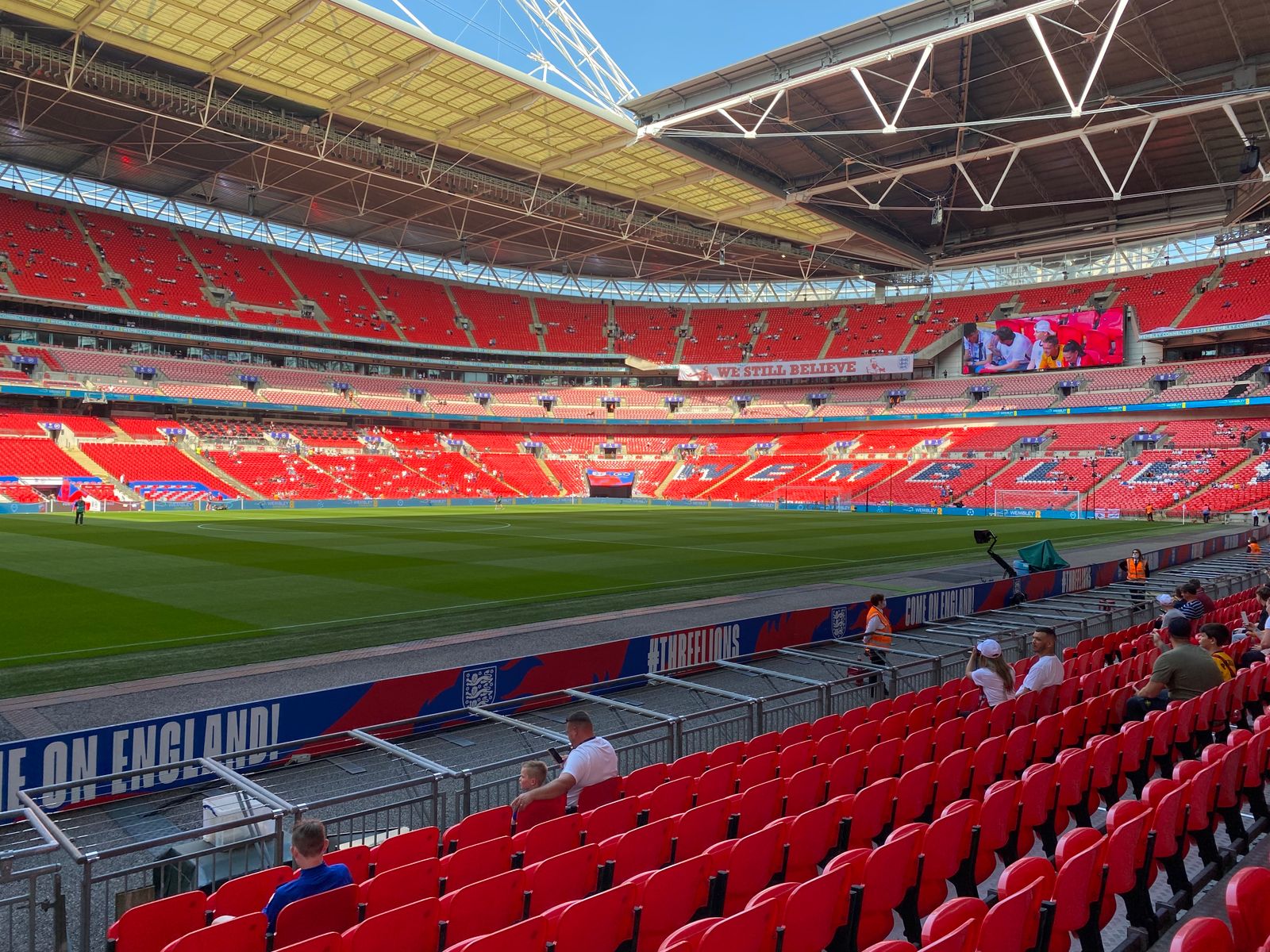 Rows of red seats inside Wembley Stadium in London, one of three 2026 NFL International Series venues in the city