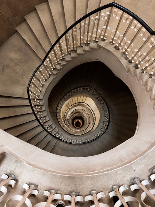 Free A Spiral Staircase Inside a Building Stock Photo