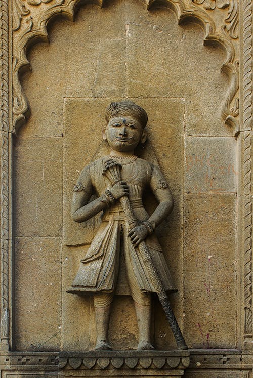 Stone Sculpture of Man