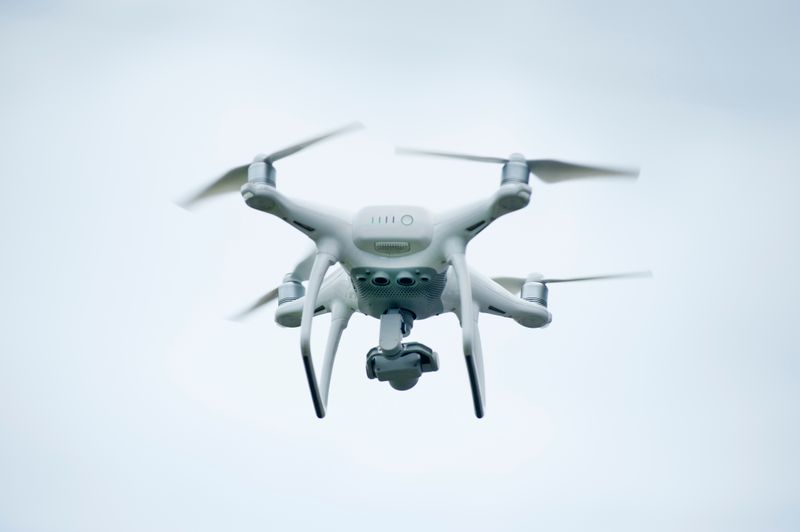 Quadcopter in flight used to illustrate pre-flight checks