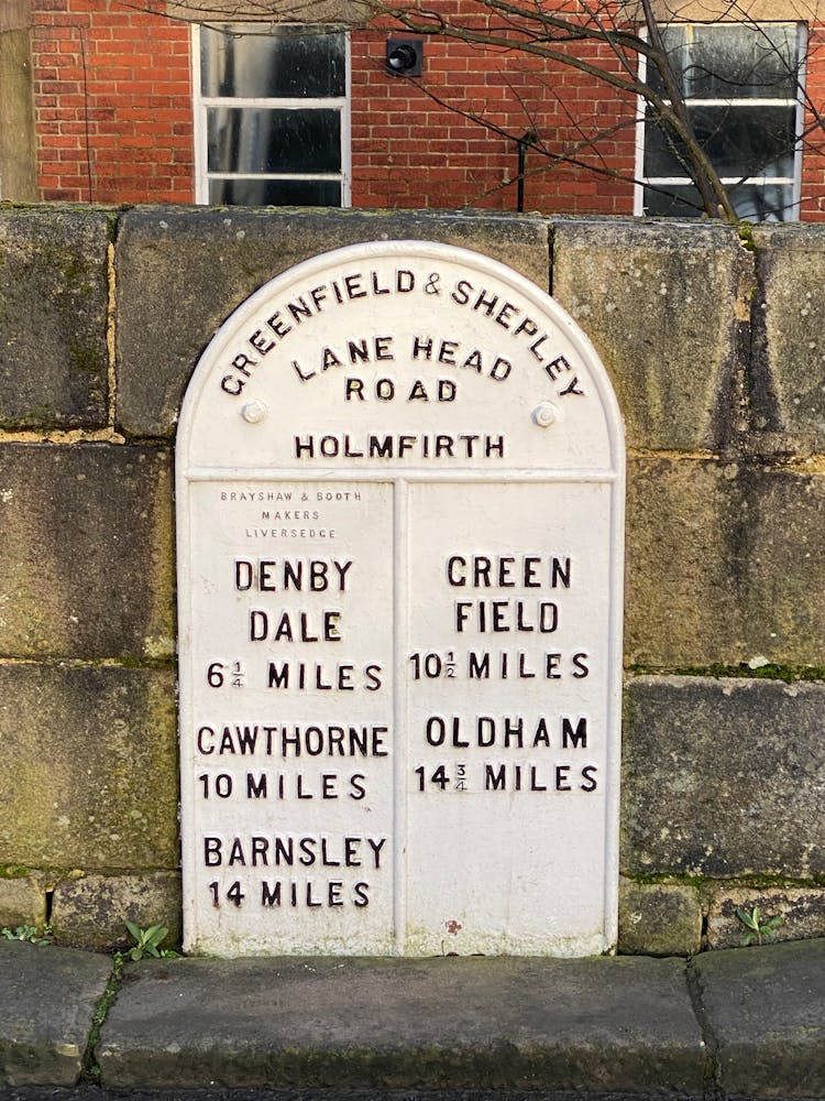 Stone Road Sign