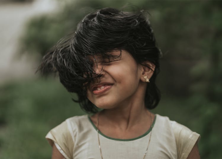 A Girl Tossing Her Hair