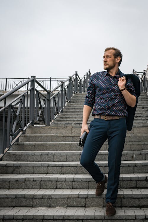 A Man Walking Down the Stairs