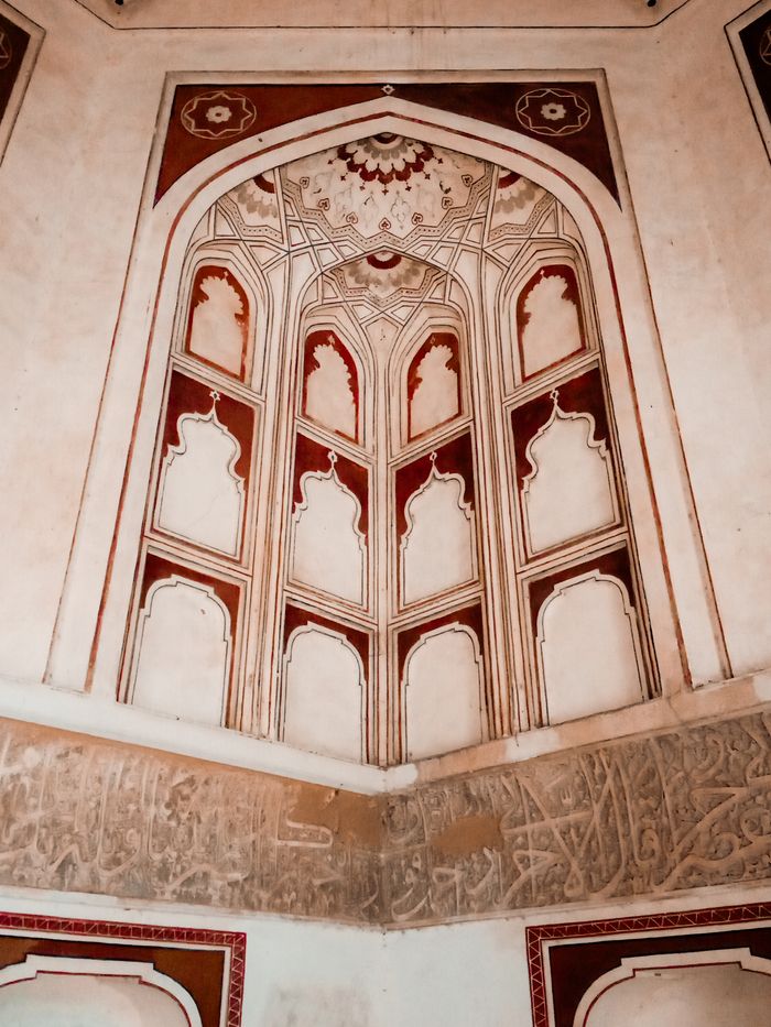 An intricately carved archway with geometric stonework