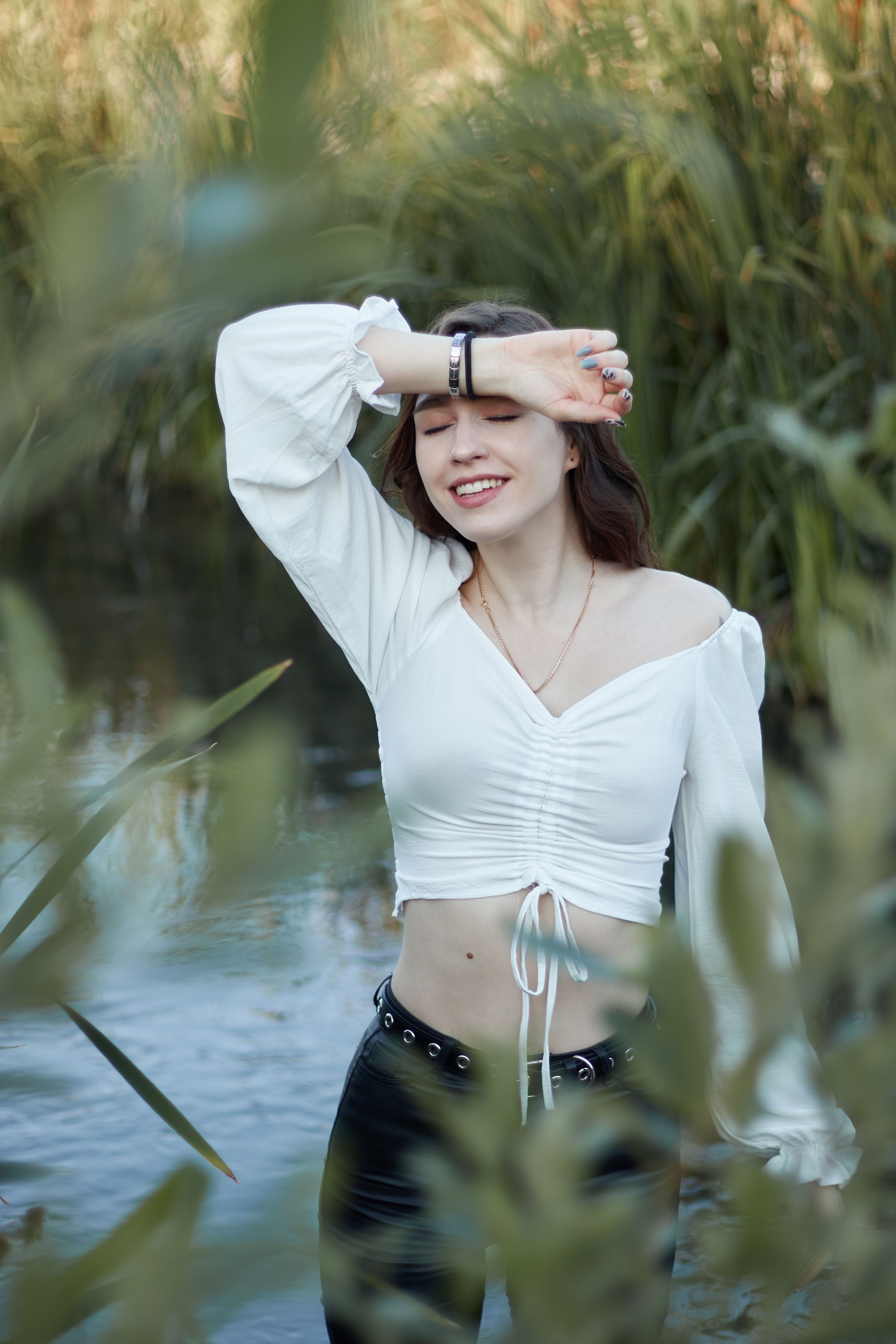 A Woman in White Long Sleeve Shirt · Free Stock Photo
