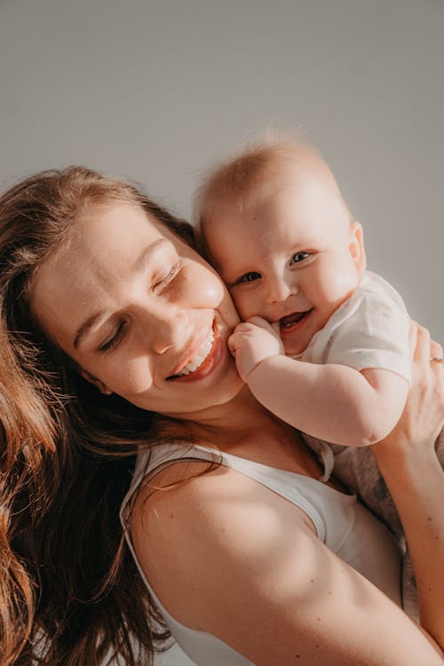 Free Mother Hugging her Baby Stock Photo
