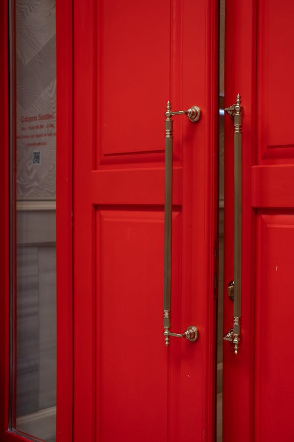 Red Double-Leaf Doors with Big Handles