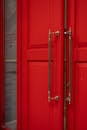 Red Double-Leaf Doors with Big Handles