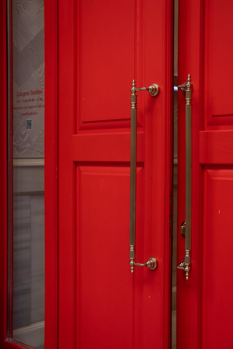 Red Double-Leaf Doors With Big Handles