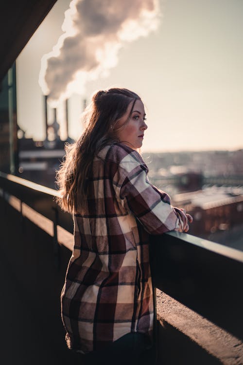 Woman Leaning on a Railing