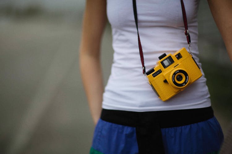 Hanging Camera On Neck Of A Person