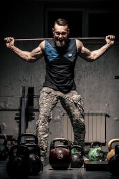 Muscular man lifting weights in a gym, showcasing strength and fitness.