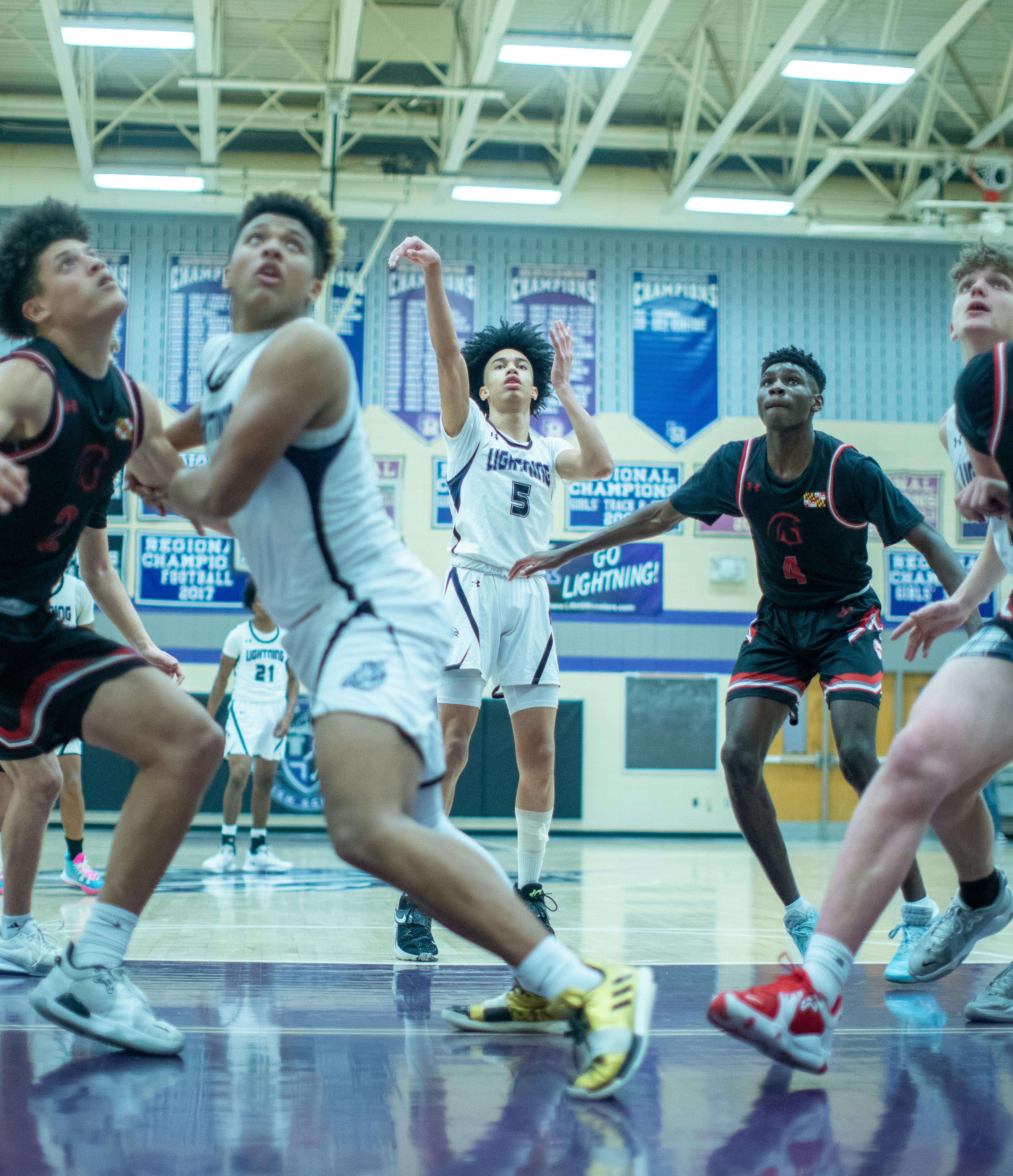 men playing basketball