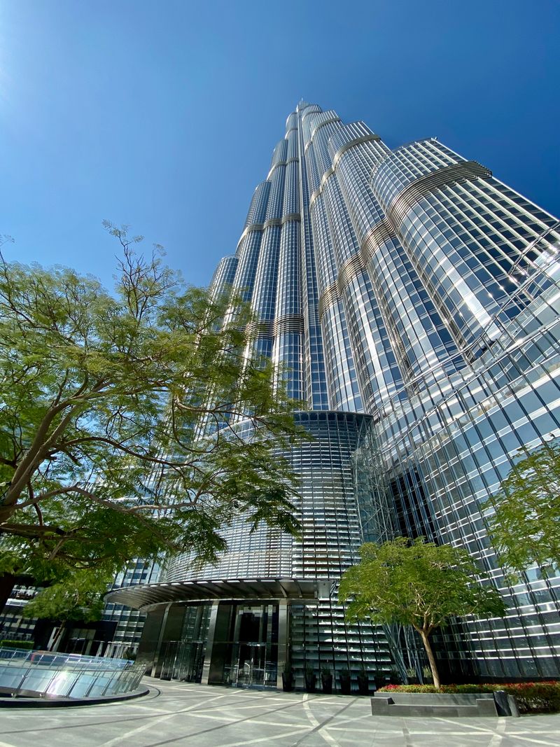 Low-angle view of the tiered glass facade of the Burj Khalifa in Dubai