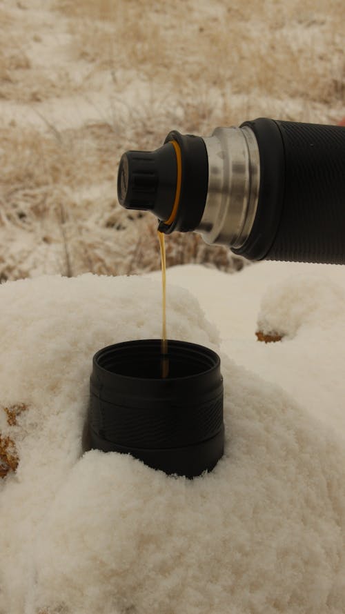 Coffee Poured From Vacuum Flask