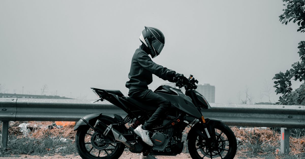 Person Rider Person Riding a Motorcycle · Free Stock Photo