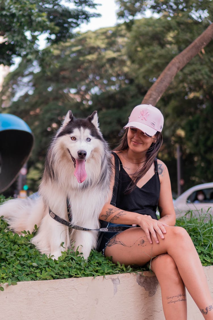 Woman With Dog On Street