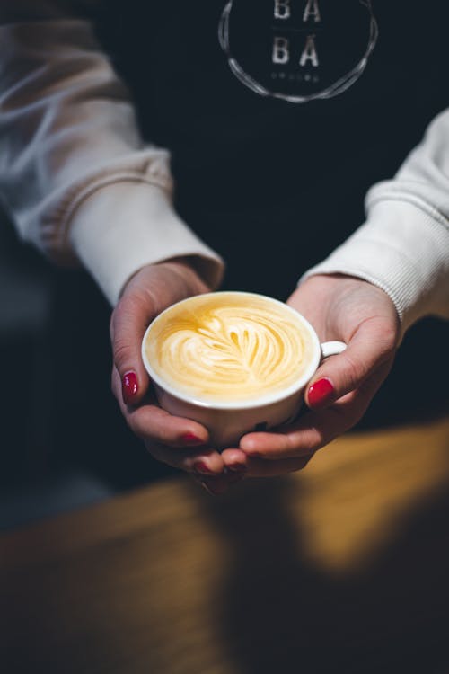 Free Cup of Coffee on Person's Hands Stock Photo