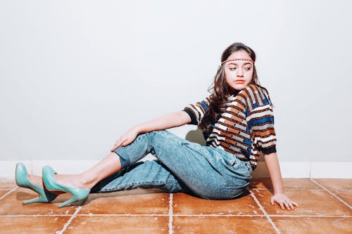 Teenage Girl Sitting on the Floor