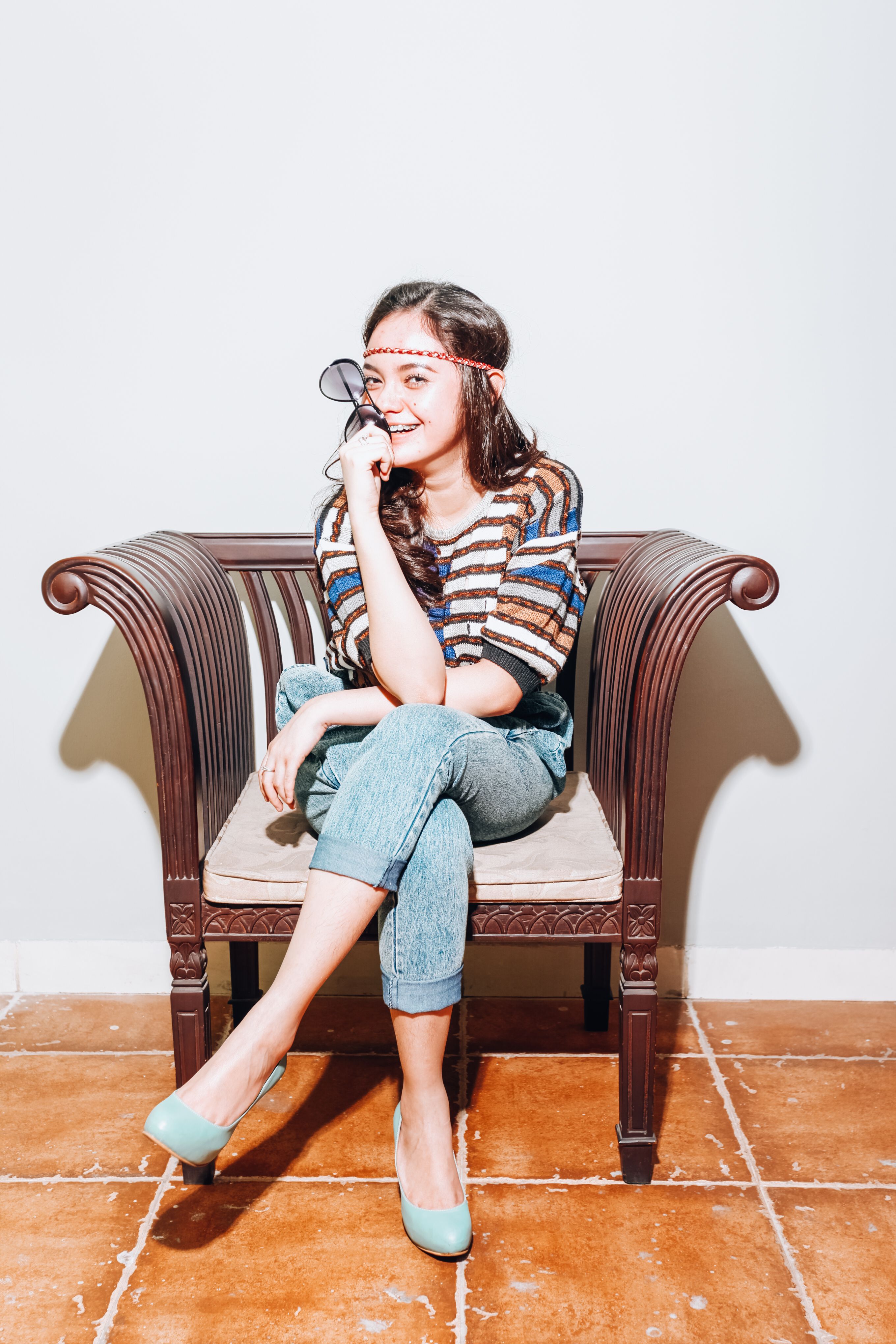 Woman in Blue Denim Jeans and Striped Top · Free Stock Photo
