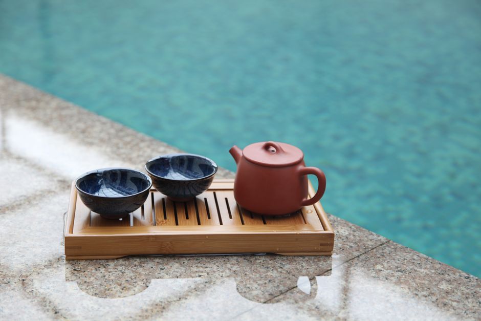 A traditional Chinese tea ceremony with intricate teaware in Shanghai, China.