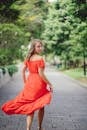 Woman Wearing Orange Off-shoulder Dress