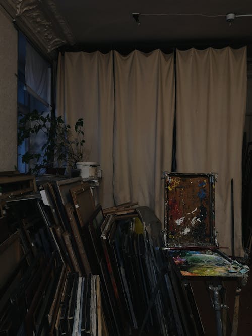 Paintings Stacked in Art Studio