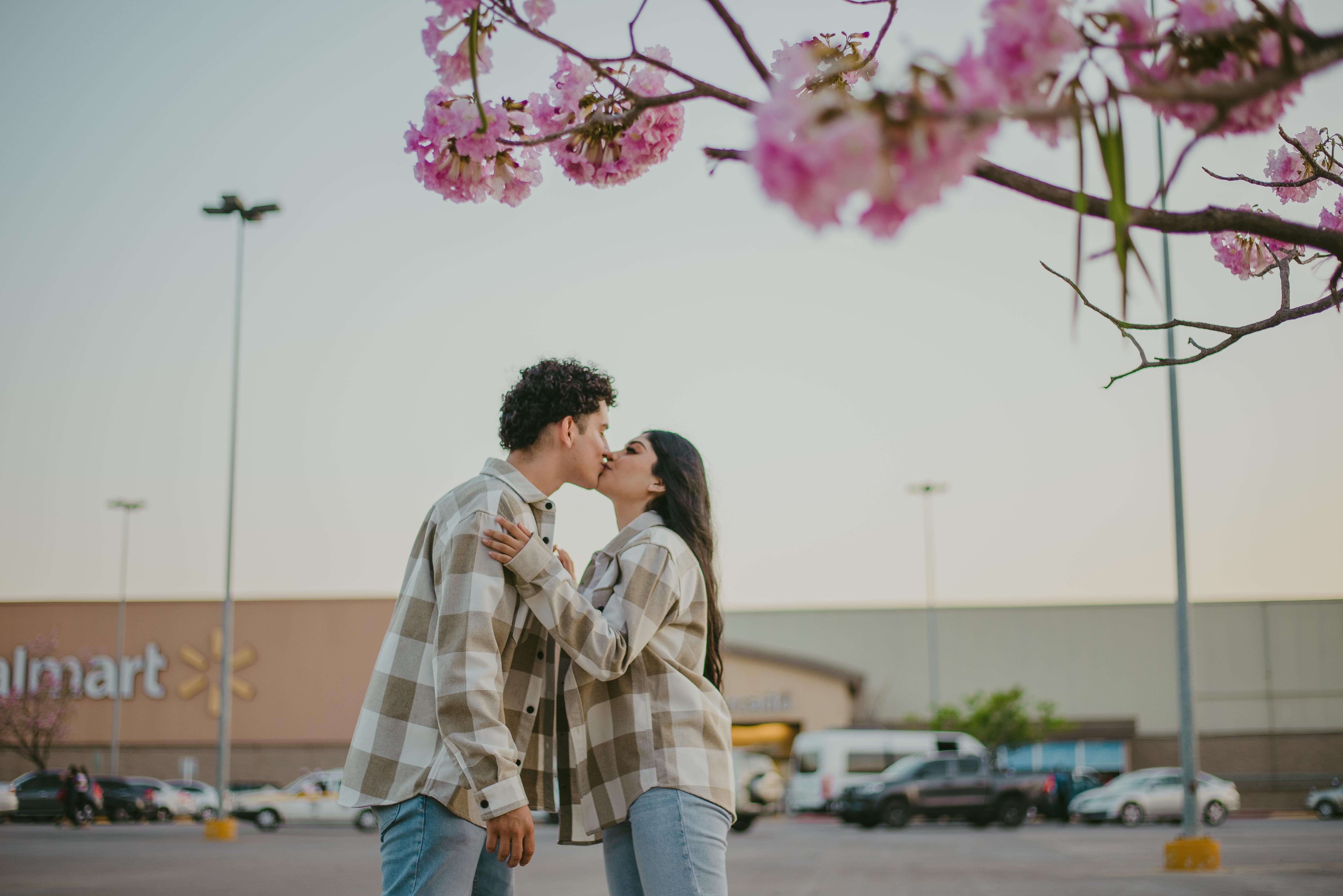 Woman in Black Leather Jacket Kissing a Man · Free Stock Photo