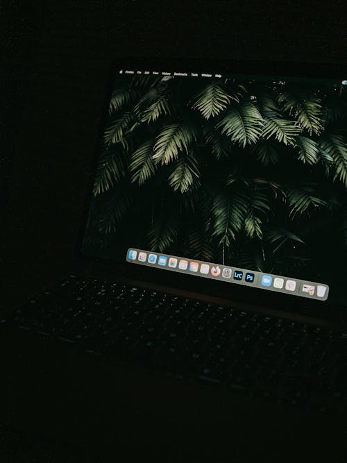 Free A Laptop Screen in the Dark Stock Photo
