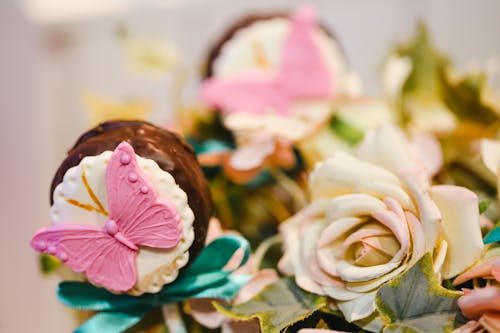Free Sweets Beside a Flower Stock Photo