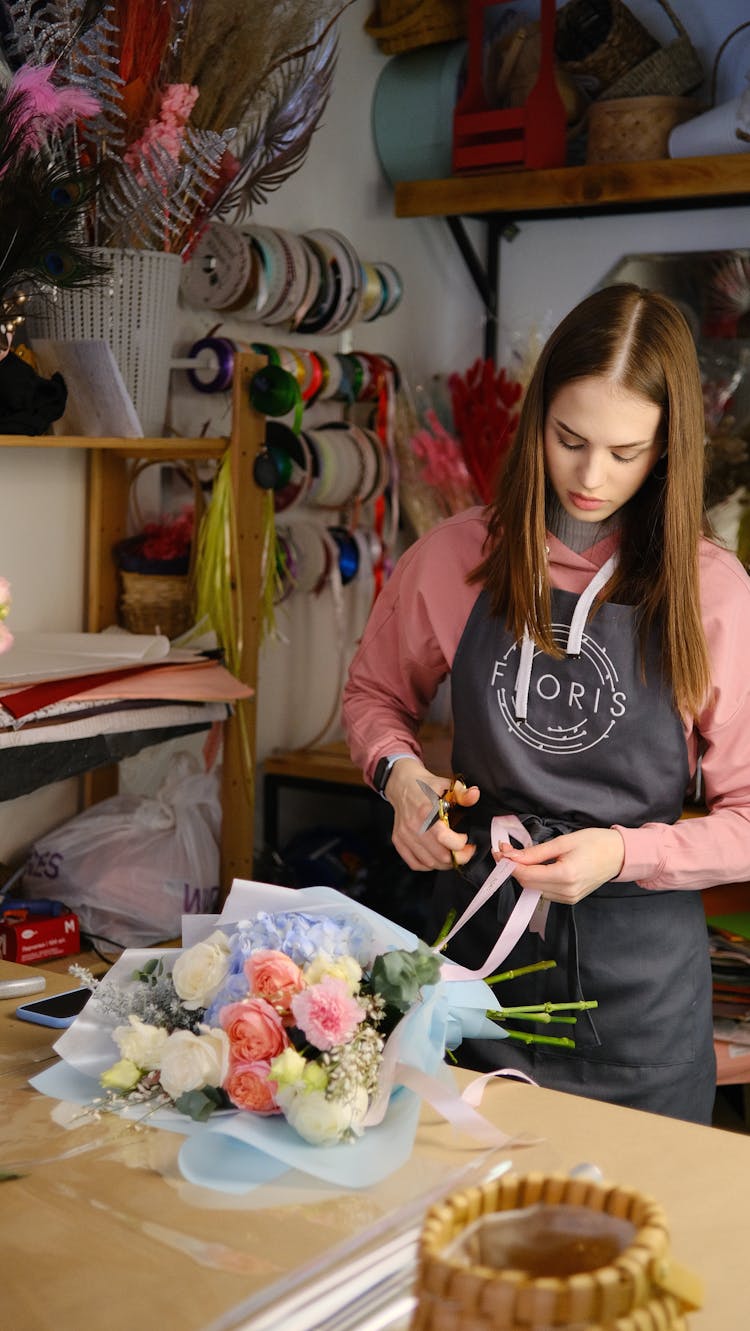 Florist Working On Bouquet