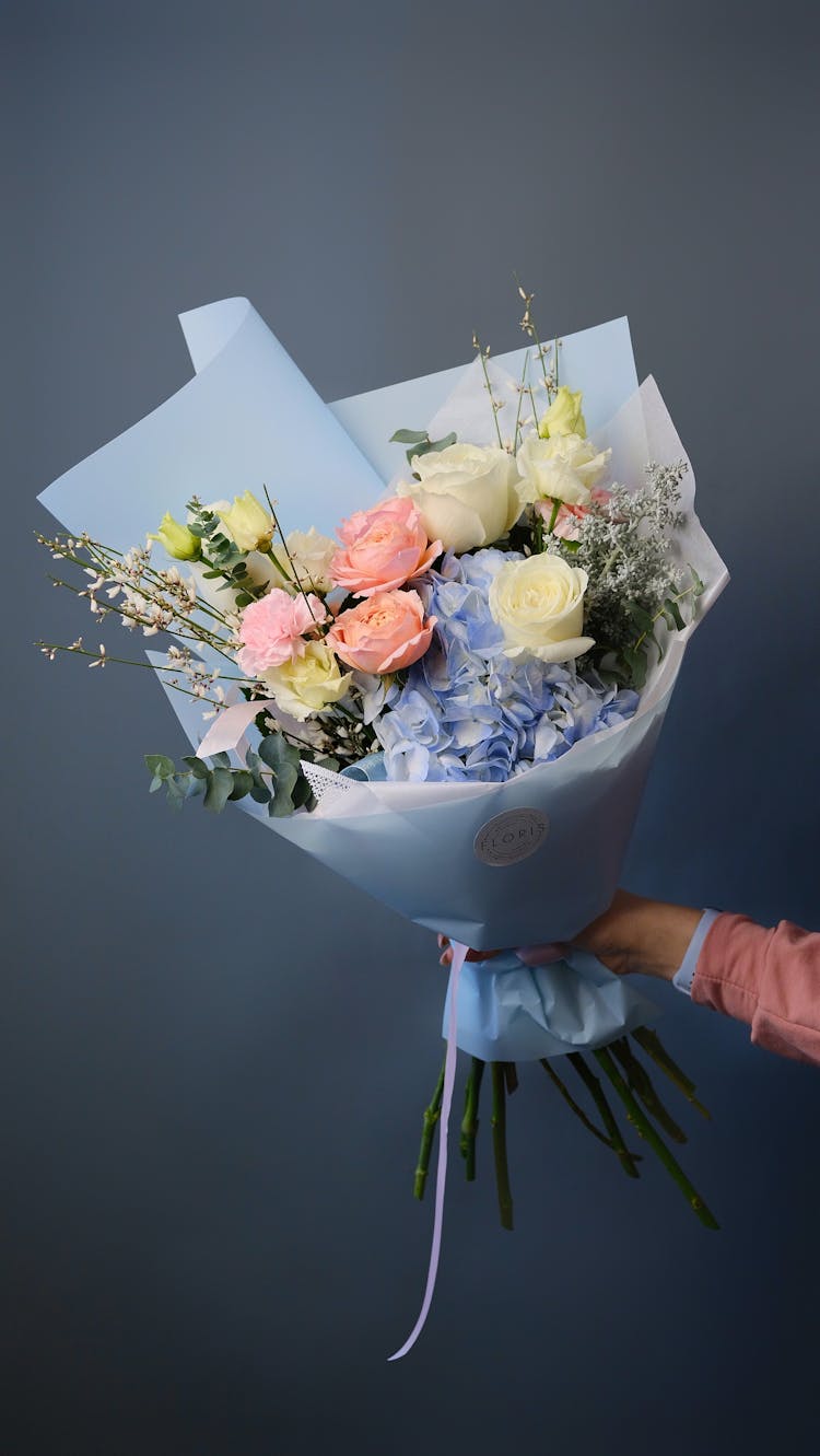 Hand Holding Bouquet