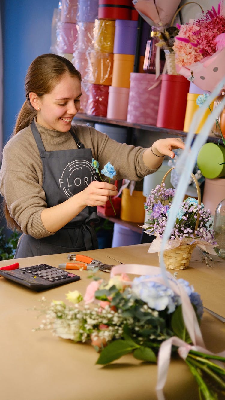 Florist Working On Bouquet