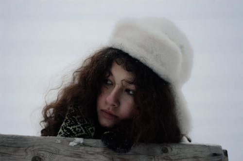 Woman Wearing White Fur Hat 