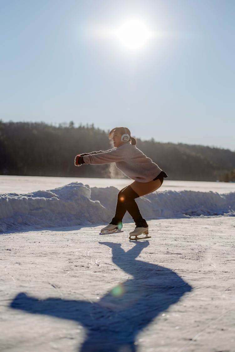 Woman Dancing On Ice Skates