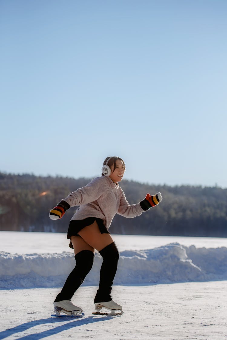 Smiling Woman Ice Skating