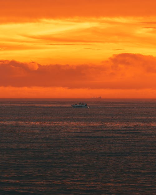 Yacht on Sea During Dusk