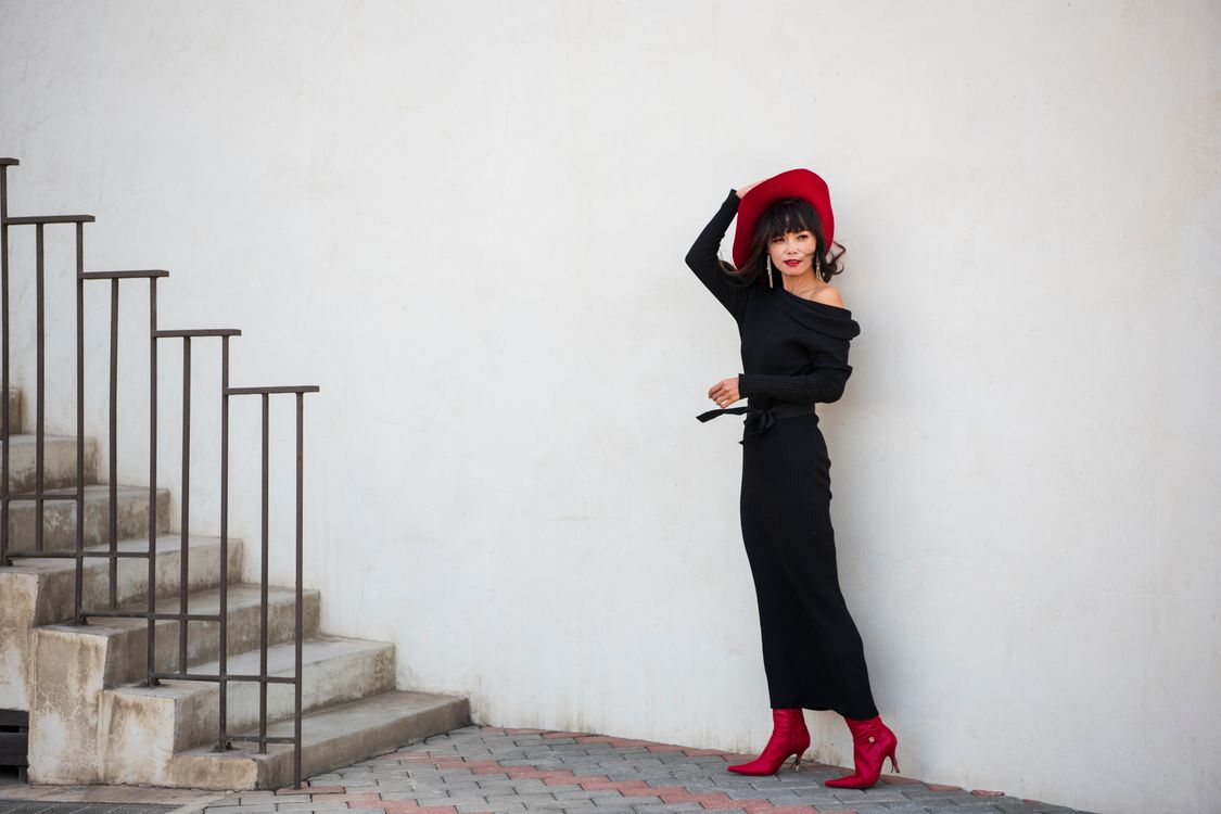 A Woman in a Black Dress Wearing a Hat Free Stock Photo A Woman in a Black Dress Wearing a Hat Free Stock Photo