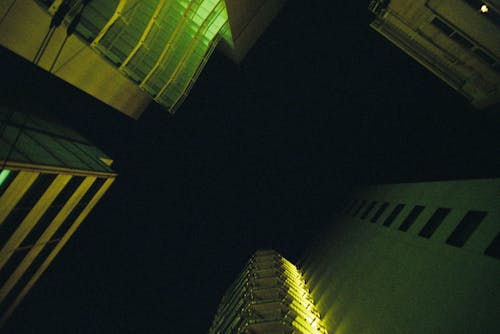 Low Angle Shot of Buildings at Night 