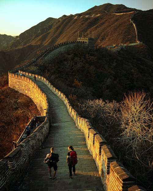 Free People Walking on Great Wall of China Stock Photo