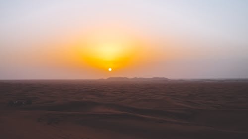 Foto stok gratis Fajar, gurun pasir, jam emas