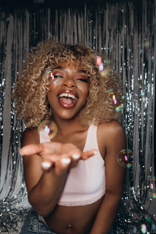 Woman Enjoying Soap Bubbles